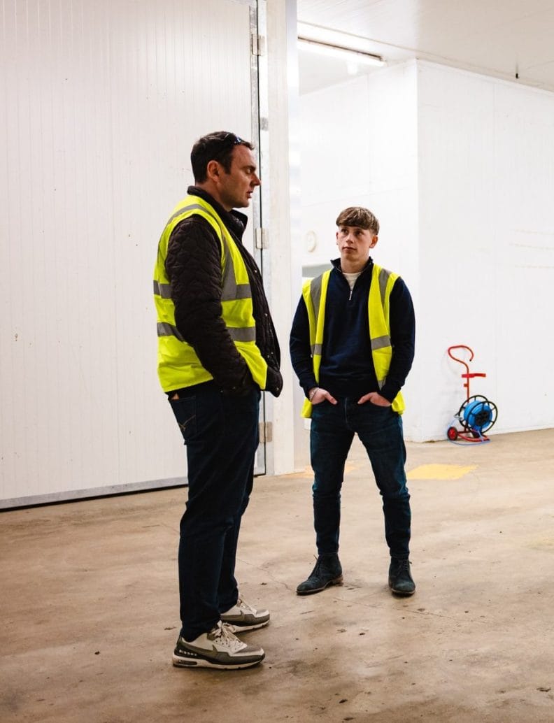 Two team members talking